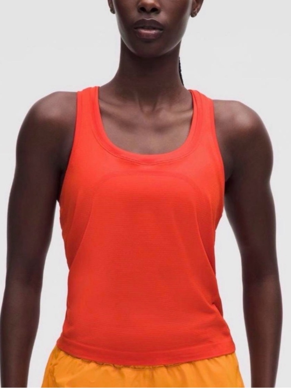 Orange Lululemon racerback tank top
